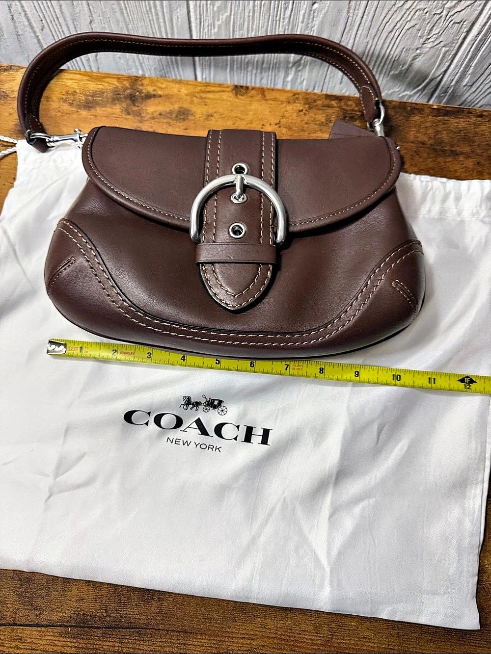 Coach Soho Flap Bag in Regenerative Leather Brown Shoulder Bag
